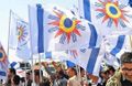 Chaldeans with Chaldean Flag.jpg